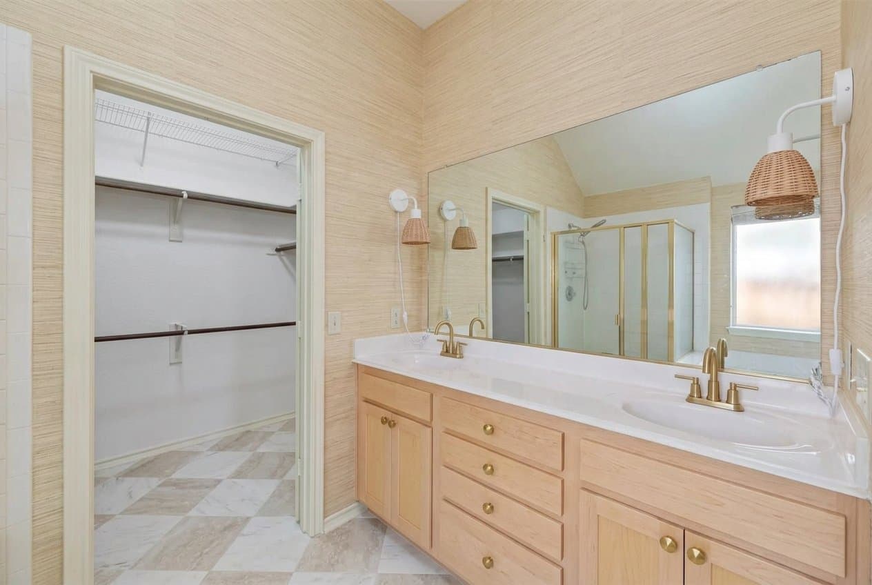 The same bathroom redesigned in the warm spa style.